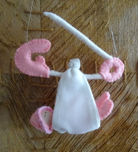 Veiligheidsspeld met baby roze kant en klaar.